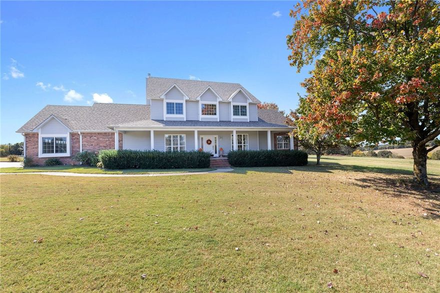 Absolutely amazing home on 20 acres! With over 3,000 square feet in the main house with 5 bedrooms, 2 full baths, and 2 half baths, plus an additional 450 square feet in the detached garage/workshop,  it's definitely spacious. And don't even get me started on the oversized two-car attached garage, the detached two-car garage with a workshop(32' x42'), and semi-finished bonus room for plenty of storage space - talk about a dream setup! Just imagine yourself stepping into the beautiful home with hardwood floors, enjoying meals in the formal dining room, cozying up by the fireplace in the spacious living room, and whipping up delicious meals in the lovely kitchen. And let's not forget about that covered back porch - the perfect spot to sip my morning coffee while soaking in those incredible distance views. This home truly sounds like a slice of paradise! Main Level 1,831 sq ft, Upstairs 1,365.sq ft