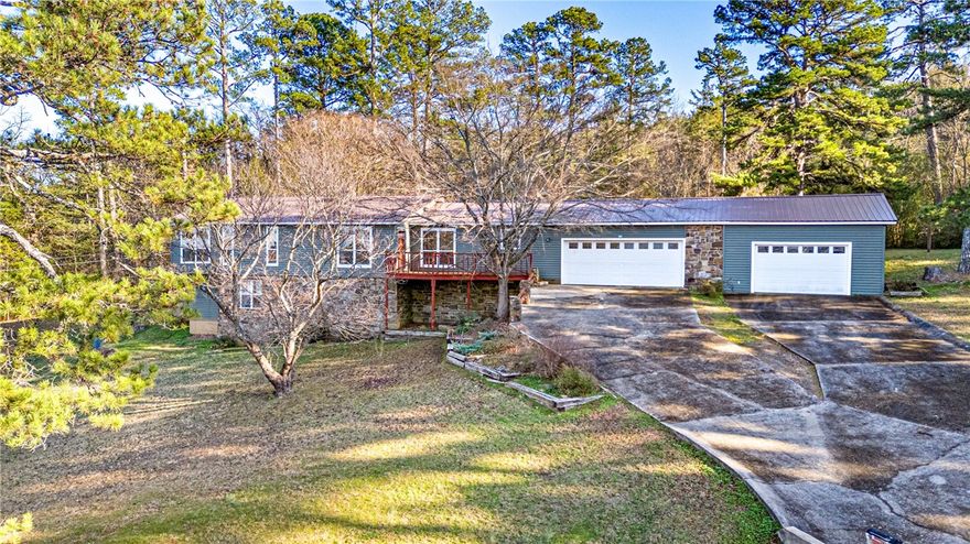 Welcome to 1081 Warren Street in Waldron, Arkansas!
This spacious 4-bedroom, 3.5-bath home offers character, flexibility, and standout features throughout. Elegant chandeliers add timeless charm to the main living and dining spaces.

The home includes a finished basement with a living area, full bathroom, and bedroom, ideal for guests, extended family, or a private retreat. The basement also has infrastructure for a wood-burning stove, offering the potential for cozy supplemental heat.

Outside, the property features an in-ground pool that is currently non-functional and will need a new liner and minor upgrades—an excellent opportunity to create a personalized backyard oasis.

Located in an established Waldron neighborhood, the home is close to schools, shopping, dining, and medical facilities, with easy access to the Ouachita National Forest and outdoor recreation. With its generous layout and strong potential, 1081 Warren Street is ready for your vision. Schedule your private showing today.