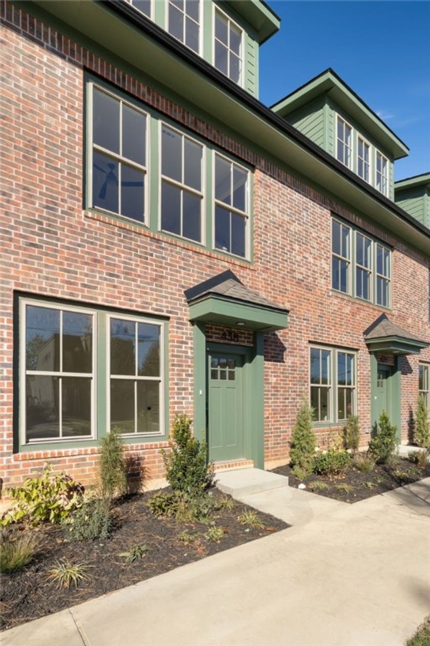 The Brookline Townhomes are here! These beautifully designed new townhomes join traditional architecture with modern construction, stylish finishes, and contemporary amenities. Each unit features a private one-car garage equipped with a 220V outlet for EV charging. Just inside, a heated and cooled flex space offers the perfect spot for a home office or creative studio. An open-concept kitchen and living area is filled with natural light, with a convenient half bath nearby. The spacious bedroom suite includes a built-in desk nook, oversized walk-in closet, and sleek full bath with walk-in shower. These townhomes are built to be highly energy efficient: perfect for those seeking a low-maintenance lifestyle and convenience. Located just minutes from the University of Arkansas and the Arts & Entertainment District, these homes provide close proximity to Fayetteville’s best attractions. See today why the Brookline Townhomes offer a unique opportunity for private, connected living in a vibrant community.