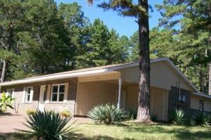 JUST REDUCED! WAS $89,900; NOW $70,000! Well maintained home! Brick outbuilding on a slab withwiring 20'x30' nice enough to make into a living quarters. Extra building lot. Storm cellar. Handicapaccessible with grab bars. Pantry & linen closet. Solid Wood interior doors. Carpet in excellent shape.New Range includes microwave, Refrigerator, and New Mini Blinds. Street-to-street lot.