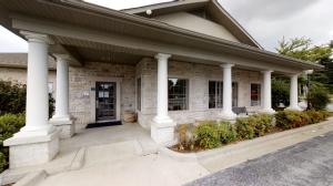 Outstanding quality professional medical building; over 7000 finished sq. ft.; large corner lot; building has limitless possibilities; currently rented to oral surgeon/hospital; great investment property with established rental income; 173' of frontage W. Bower and 212' frontage on N. Pine; lots of parking