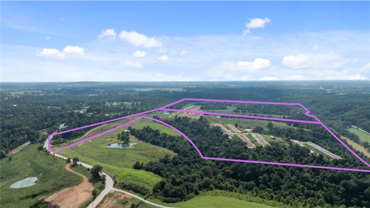 Premier Northwest Arkansas Development Opportunity!
Seize this rare 114-acre blank canvas in NWA, perfectly suited for a high-demand RV resort, luxury glamping destination, or exclusive event venue.
The most significant investment is already made for you: City Water, Natural Gas, and Electric are all on-site, drastically cutting your startup costs and timeline. Two existing wells provide bonus water resources for irrigation and amenities.
The property is being cleared of all former structures, delivering a pristine, shovel-ready site for your vision. The market for unique outdoor experiences is exploding in this region. This is your chance to build a landmark destination with the most critical and costly infrastructure already in place. Don't miss this strategic investment.
