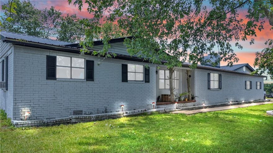 Charming Hobby Farm with Endless Potential! Welcome to your dream countryside escape! This warm and inviting 3-bedroom, 2-bath home is full of charm and functionality. Enjoy cozy evenings by the fireplace, relax in one of the two spacious living areas, or take advantage of the versatile bonus room—perfect for a home office, gym, or playroom. Need space for projects? The garage includes a dedicated workspace, ideal for hobbies or storage. Step outside to your own private paradise featuring a lush pasture, a fully stocked year-round pond, and a barn—ready for your horses, calves, or weekend farming dreams. Just move in and start living the lifestyle you’ve always wanted. Endless possibilities with this large 53X60 building built in 2023! Don’t miss out on this rare gem—schedule your tour today before it’s gone!