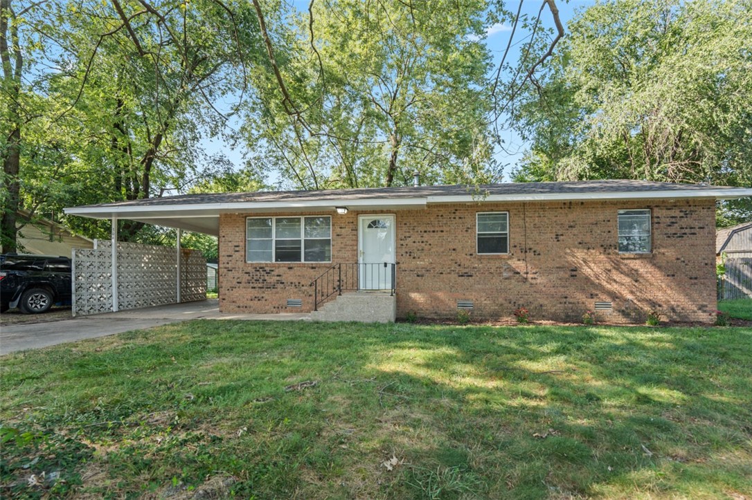 Seller is offering a rate buy down to make the monthly payment cheaper. Location in Gravette doesn't get much better than this. Come see this fully renovated home sitting conveniently within walking distance to Harps, Taco Bell and near schools. Home features all new appliances, brand new roof, fenced in backyard with carport. Home has been fully renovated with high quality finishes in all main areas including kitchen, bathroom with dual vanity, and living areas - All at an affordable price under $200k.