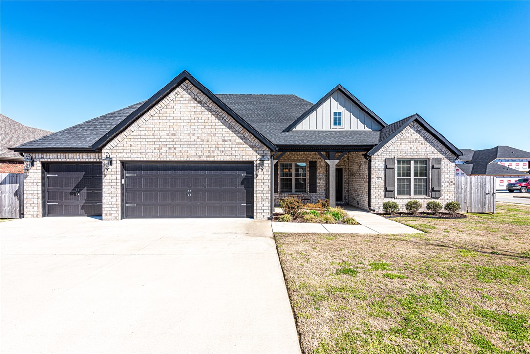 NEW ON THE MARKET! This 4 bedroom 3 bath home near shopping & eateries w/ convenient access to Hwy 412! This all brick home features a landscaped lawn & covered front porch perfect for having coffee in the morning! Step inside you find high vaulted ceilings w/ beams, wood floors, a gas log fireplace, & open concept perfect for entertaining guests & family! You’ll be the perfect host when you cook in your creamy white & spacious kitchen with SS appliances, recessed lighting, crown molding, wood-look tile, a separate cooktop, double oven, farmhouse sink, abundant cabinetry, bar top counter space, & eat-in kitchen nook! Hide away in your private master suite or relax in your master spa with tiled walk-in shower, double sinks, whirlpool tub, wood-look tile, & crown molding! BONUS! An additional spacious bedroom perfect for a game room! Plus 2 additional bedrooms & 2 more full baths! Step onto the covered back patio to enjoy warm summer nights or on the extended patio in your private & fully fenced backyard! Act quick!
