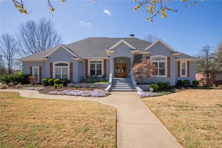 Estate home nestled in the centrally located Harber Meadows neighborhood is ready to mingle with many upgrades throughout.  New garage door opener 2023, fence 2021, leafguard gutter cover 2021, sprinkler upgraded 2023, new central vac motor 2022, new paint in kitchen, living room and exterior 2020, new ceiling fans throughout 2020, new living room ceiling speakers 2022, new landscaping 2023, new roof 2019, new front doors 2020. In addition this home features great entertaining spaces inside and out. Finished walk out on lower level to a private backyard that will support a pool and offers full kitchen, living area, media/gym room, bedroom, full bath, workshop and extra storage. This estate home has amazing open living living areas on both floors for a large family to reside. Remainder of home warranty will convey.  Welcome HOME!