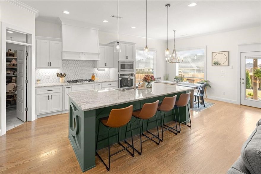 If value is what you are looking for, then look at the price per foot with this most recent price decrease on a wonderful floor plan with a 3 car garage located in Centerton! 
Real hardwood floors flow throughout the living room, kitchen, and all main living areas — with LVP in the primary bedroom! The kitchen features lovely cabinetry, a built-in oven, gas cooktop, and plenty of space to cook, gather, and entertain.  This is an Anderson built home and one of the best floor plans for the family with a bonus room/bedroom upstairs.
The backyard is already established and ready to enjoy- fully fenced with a covered patio and cozy gas fireplace lined with evergreens on the fence line — perfect for relaxing evenings or hosting friends. There’s even a converted stock tank pool that’s sure to be a hit with the kids.
With generous space, charming style, and a prime location near top-rated schools, shopping, and amenities, this home truly offers the best of comfort and convenience.  Schedule your own private viewing!