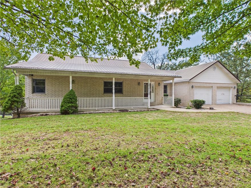 Spacious 3 bedroom, 3 bath home situated on a large double lot in a quiet subdivision conveniently located between Branson, MO and Harrison, AR. This property offers handicap accessibility, including a garage designed for easy access. Inside, you’ll enjoy multiple living spaces including a large family room in the basement, perfect for gatherings, plus a dedicated workshop area for hobbies or projects. A bright sunroom adds extra space for relaxation and overlooks the expansive yard. With plenty of room both inside and out, this home combines comfort, function, and a great location.