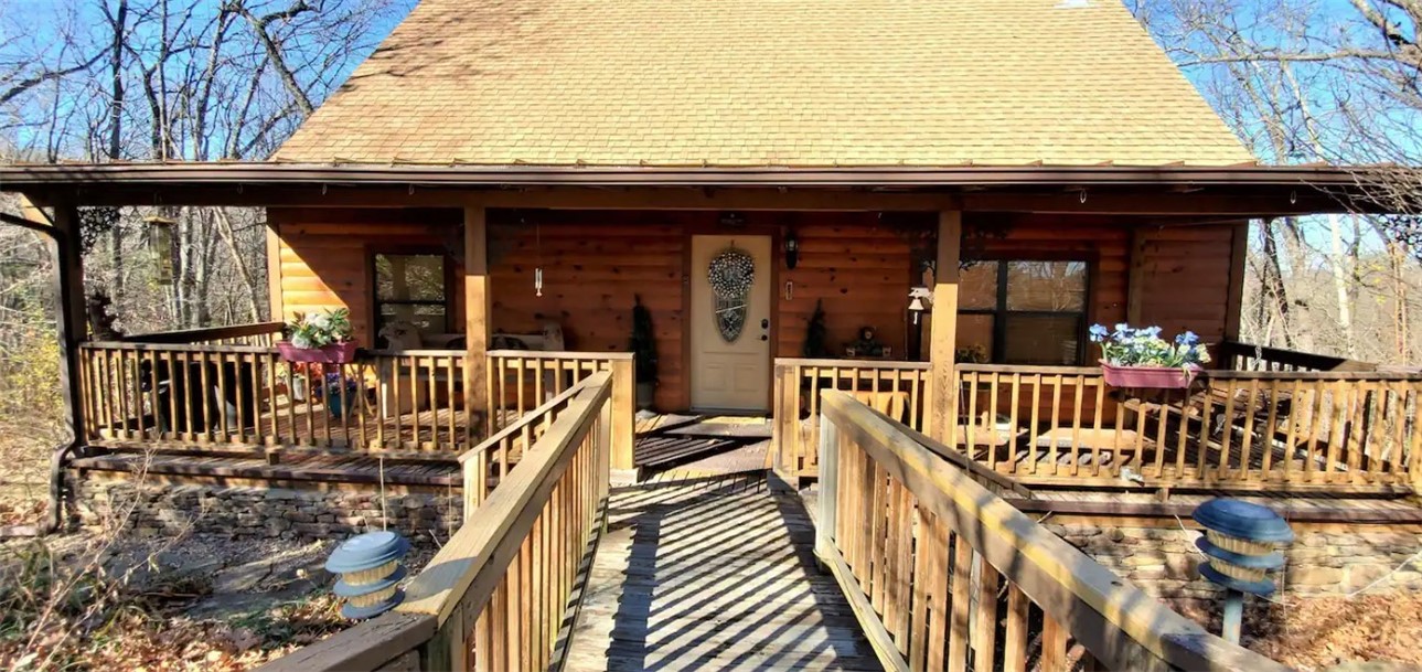 If you are looking for vacationing, investing or living in Holiday Island, this is your opportunity. Very well maintained cabin with log siding and wooded interior. It sells fully furnished, turn key. The loft could be a third bedroom with a queen size bed. It is an active VRBO and has made a nice investment property for the current owners. The stove, refrigerator and heat and air were replaced in 2022 and water heater in 2021.