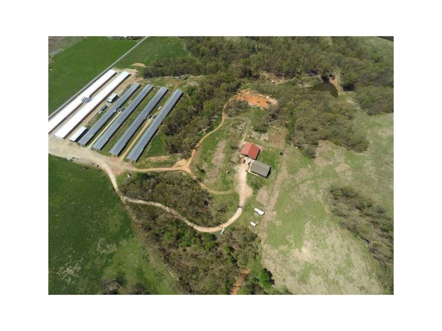 6 house turn key broiler farm on 40 acres. incredible money maker. (2) New 66 X 600 and (4) 43 X 500 updated, and ready to go. 2300+ sq ft 4 bedroom 2 bath home with Large 60 X 60 shop building with lean to. Incredible views, some good grazing, fishing and some good hunting as well.  Natural gas and rural water. New corrals with tub.