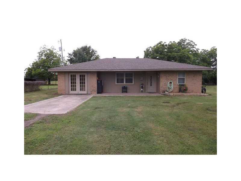 Very nice, peaceful three bedroom one bath brick home on level one acre lot. One year old HVAC unit & one year old roof Lifetime warranty on Window World windows that are high efficiency tilt ins. In ground storm shelter & detached workshop/storage.,City water, and also a Well on property for gardening. Owners have installed new carpet. Call today to view the nice country home.