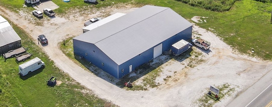Recently constructed and situated on 4.50 level acres, this flexible, well-equipped space offers 6,000 sq. ft. of fully climate-controlled warehouse, office, & flex space with full foam insulation throughout. 3 oversized offices, 2.5 bathrooms, oversized conference room, kitchenette, and a large reception area with tall ceilings perfect for display & client engagement. The warehouse features Two 14x18 overhead doors for flexible logistics & ample space for operations. Parking for employees and visitors. Flexible commercial space that combines office and industrial warehouse capacity with highway frontage. This property is ideal for a new business venture or as a tenant occupied commercial space. Also listed ML #: 1315658