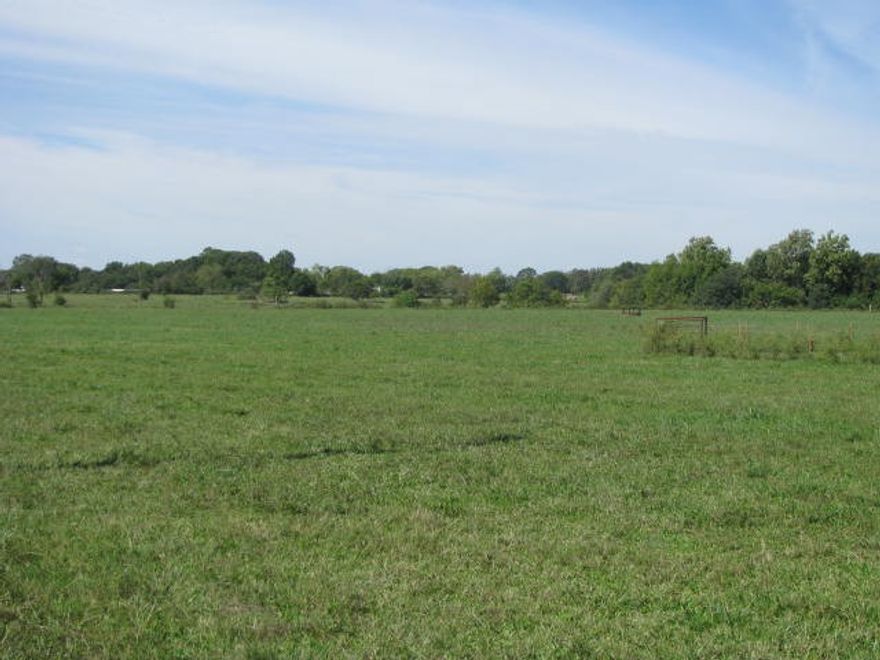 Exceptional development property located off US 49 & HWY 72. next to the New Arkansas Welcome Center (currently under construction). The property includes 2 parcels totaling 27.13 acres in the City limits. Taxes reflect both parcels. City of Gravette approved City Sewer anticipated early 2026. With Commercial C-2 zoning this offers INVESTERS a wide range of development possibilities with unmatched visibility and potential. Excellent access,1123' ft. of HWY 72 frontage, directly off US 49. INVESTERS, you couldn't ask for a better location, whether your planning Retail, Convivence store, Grocery store, Auto dealership, Church, Rec/Center or something entirely unique, this land offers endless potential in the Gravette community. This level cleared land has 2 older rental homes, large barn and outbuildings. Great opportunity in a prime location for future development. Owner will consider splitting the acreage.  HWY 72 daily traffic count (11,000). US 49 daily traffic count North & South bound (20,000). Act Now!!