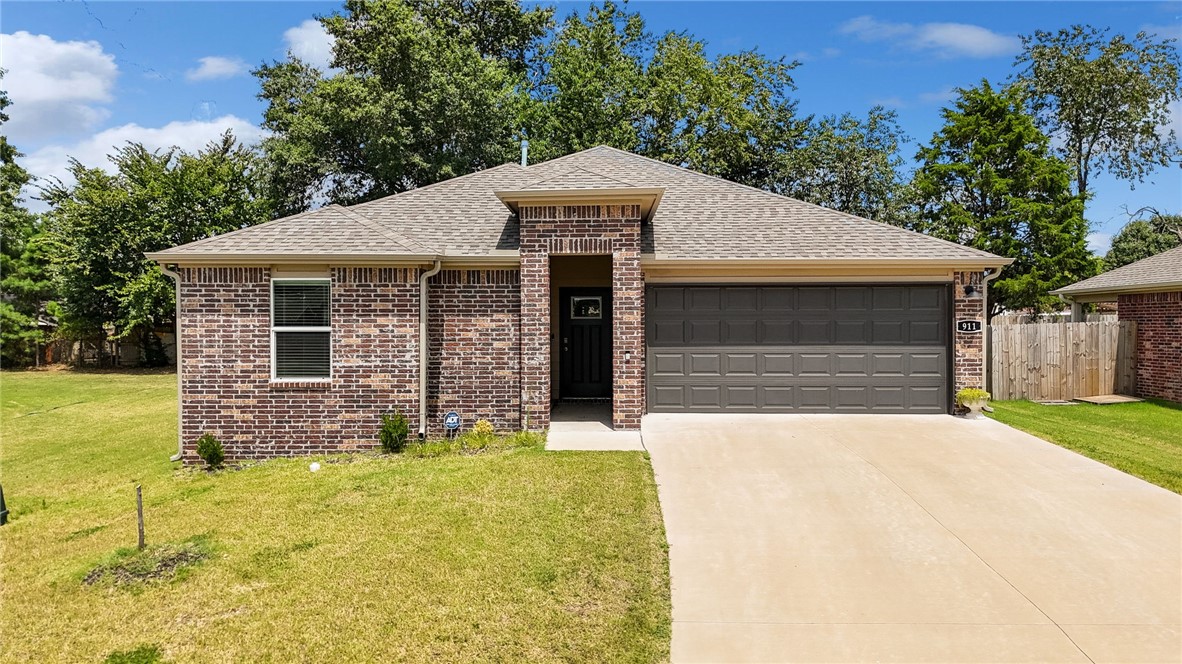 Welcome to 911 W Sonoma St in Rogers! This like-new home, built in 2023 by D.R. Horton, offers 3 bedrooms, 2 full bathrooms, and 1,262 sq ft of thoughtfully designed living space. The open-concept floor plan features a spacious kitchen with granite countertops, a gas range, and modern finishes throughout. Nestled on a .14-acre lot, this home provides the perfect balance of comfort and convenience. Centrally located in Rogers, you’ll be just minutes from shopping, dining, schools, and everything Northwest Arkansas has to offer. Don’t miss the chance to make this move-in-ready home yours!