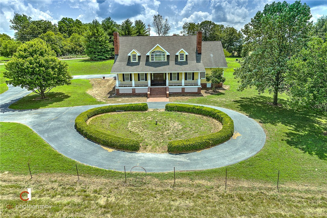 Beautiful Estate home with acreage, overlooking a peaceful valley! Great place to raise your family and to be close to town, yet in the Country! Fresh paint & cleaned throughout! Huge game room upstairs, pool table included! Knotty pine office with fireplace. Huge open kitchen to the living area. 4 fireplaces total & above ground pool. Some extra inside features: bidet in master bath; fireplace in master bedroom, a "step-up" for child to wash hands in their pvt. bath; cedar closet; attic fan; dumbwaiter for laundry between 1st & 2nd floor; secret gun closet! Extra features outside: covered front porch 50' x 10'; covered back patio 38' x 7'; a firehose connection that helps lower insurance; 5 dog kennels with storage building. Reference MLS#1154794 for smaller acreage.