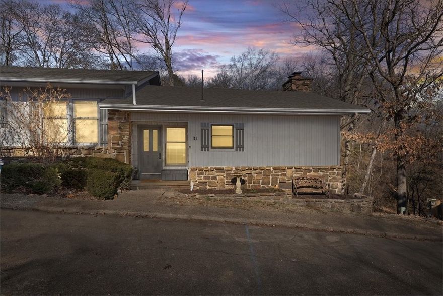 Surrounded by wooded trails and tucked into one of Bella Vista’s most recreation-rich locations, this meticulously maintained 3-bedroom, 2-bath corner townhome offers the perfect blend of privacy, lifestyle, and opportunity. Overlooking the woods and trail system, the setting feels peaceful and connected to nature, yet you’re just blocks from the Bella Vista Rec Center, tennis courts, & pools, and only minutes from the new OZ Trails Bike Park opening next summer. The townhome features great bones and has been thoughtfully cared for, providing a true blank canvas for a buyer to personalize and add value. Recent updates include brand-new stainless steel appliances, while two beautiful stone fireplaces add warmth and character. The corner location enhances natural light and privacy, making this townhome feel more like a retreat than a typical attached home. Whether you’re an investor or a buyer looking to create a space that reflects your style, this is a rare opportunity in a highly desirable Bella Vista location.