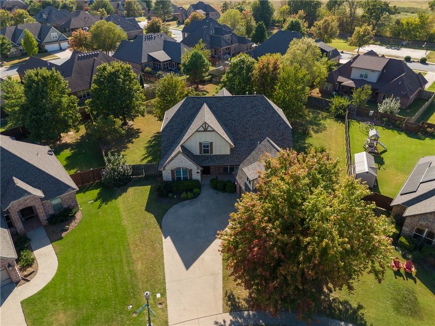 Well maintained one owner home in the desirable Warren Glenn sub division in the SW Rogers/Pinnacle area. Nestled on a "park like" half acre lot this home is in the right location with the right features. On the main level you'll find the large primary bedroom with cathedral ceilings and the primary bath that has been completely updated including heated floors, an office with beautiful real wood floors and built ins or could be a bedroom, beautiful open dining area with real wood floors, a large family room with beautiful picture windows overlooking a private back yard, an updated kitchen and a large laundry room and half bath. Upstairs you'll find two additional bedrooms and a bonus room that could also be a bedroom and a full bath. Outside you'll enjoy great curb appeal, a large private back yard and a large two-tier deck with a sauna and a covered porch. This home in this location in this neighborhood and in "like new" condition is exactly what you've been waiting for.