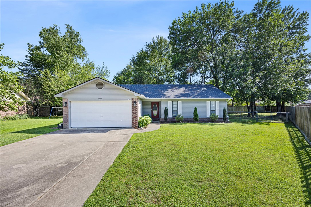 Welcome to 603 Cricket Cove—this semi-open-concept 3 bedroom, 2 bathroom home offers 1,600 square feet of move-in-ready comfort in a quiet cul-de-sac. Located just steps from Russellville Middle School and in the Dwight Elementary zone, this home features a fully fenced yard, perfect for relaxing or entertaining. Inside, enjoy updated flooring, lighting, bathrooms, and fresh paint throughout. The kitchen boasts updated cabinets and a large pantry. With a two-car garage and thoughtful upgrades throughout, this home is ready for you—schedule your showing today!