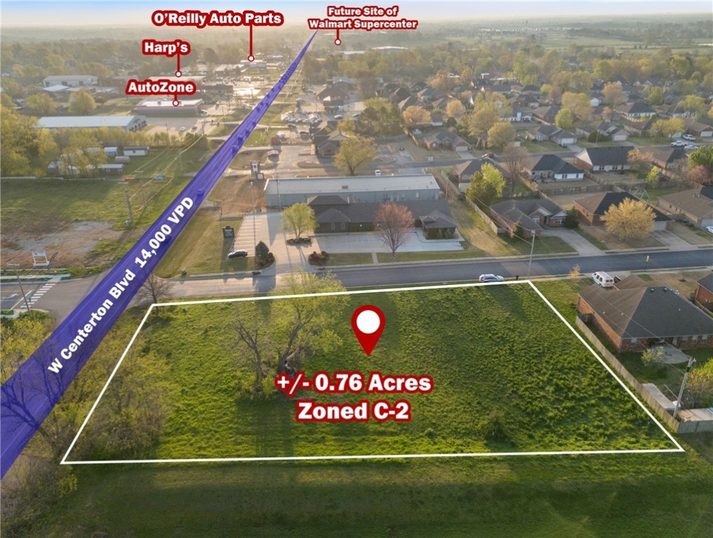 +/- 0.76 acres of prime commercial land for lease, perfectly positioned right off Centerton Blvd in Centerton, AR. Currently zoned C-2 with all utilities available at the street. It's strategic location places it just 2 minutes from Main Street Centerton, Casey's General Store, and McDonald's, 3 minutes from the proposed Walmart Supercenter, and 5 minutes from Bentonville West High School. Additionally, it is just 1 minute from the newly opened Domino's Pizza and surrounded by established residential neighborhoods. With excellent visibility and an average traffic count of approx. 14,000 VPD, this site is a prime opportunity. Offered at $4,500/mo on an absolute net lease.