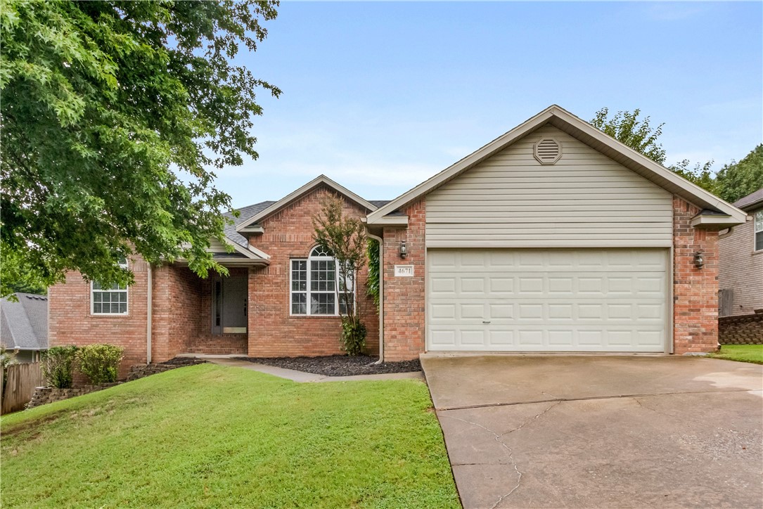 Back on the market due to no fault of sellers. This lovely brick home is in a tranquil, established neighborhood with easy access to I-49, downtown Johnson, Lake Fayetteville, and central to all of NW Arkansas. So many updates in the last few years: new paint recently added throughout, new roof, gutters, water heater and garbage disposal in 2022, re-built deck and new stainless steel appliances in 2020. The home has an abundance of natural light with a vaulted ceiling in the living room, a beautiful fireplace, and a flex space for dining or office. The eat-in kitchen has spacious white oak cabinetry, new appliances, a bar for seating and a pantry for extra storage. The split floor plan features a nice master suite with a tray ceiling in the bedroom and an ensuite with a jacuzzi tub, separate shower, double vanity and a large walk-in closet. Don't miss the opportunity to own this home.