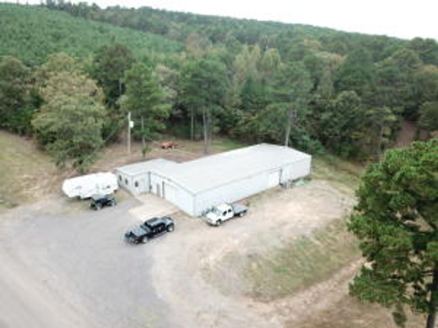 LOOKING FOR A PLACE TO BUILD THAT DREAM HOME!OR A PLACE TO START YOUR OWN BUSINESS?LOCATED JUST MINUTES OUTSIDE OF DARDANELLE ,THIS 3 ACRE LOT ALREADY HAS A 40x95 COMMERCIAL TYPE SHOP WITH 400 AMP SERVICE, COMPLETE WITH A 20X30 OFFICE/ LIVING QUARTERS.EXTRA THICK CONCRETE FLOORINGAND WELL INSULATED.
