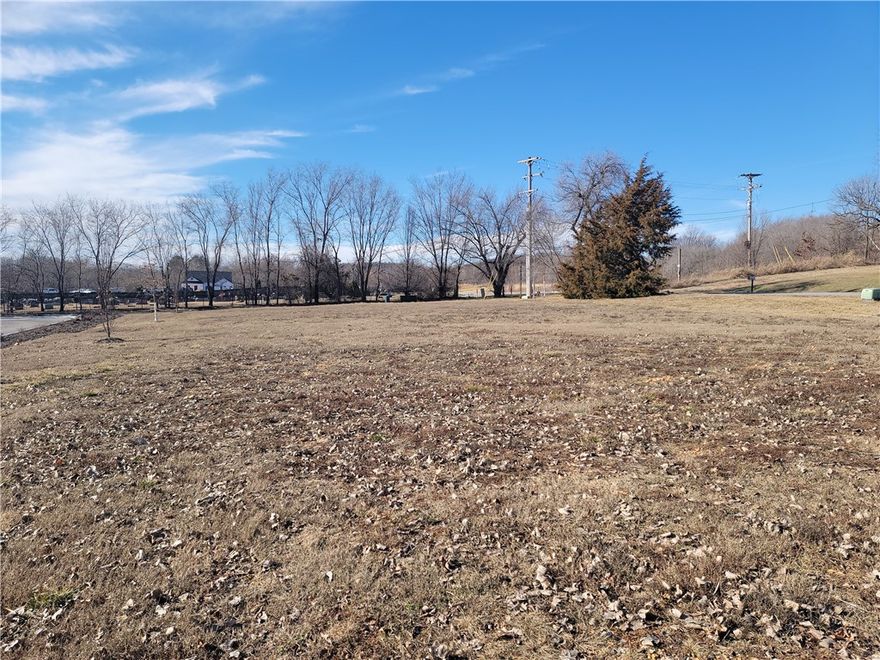 Easily buildable corner lot located just off of I-49 in Johnson. Currently zoned UN-2 which could allow for a number of uses.  Just steps away from Willow Creek Hospital and numerous other medical related buildings. See attached survey.