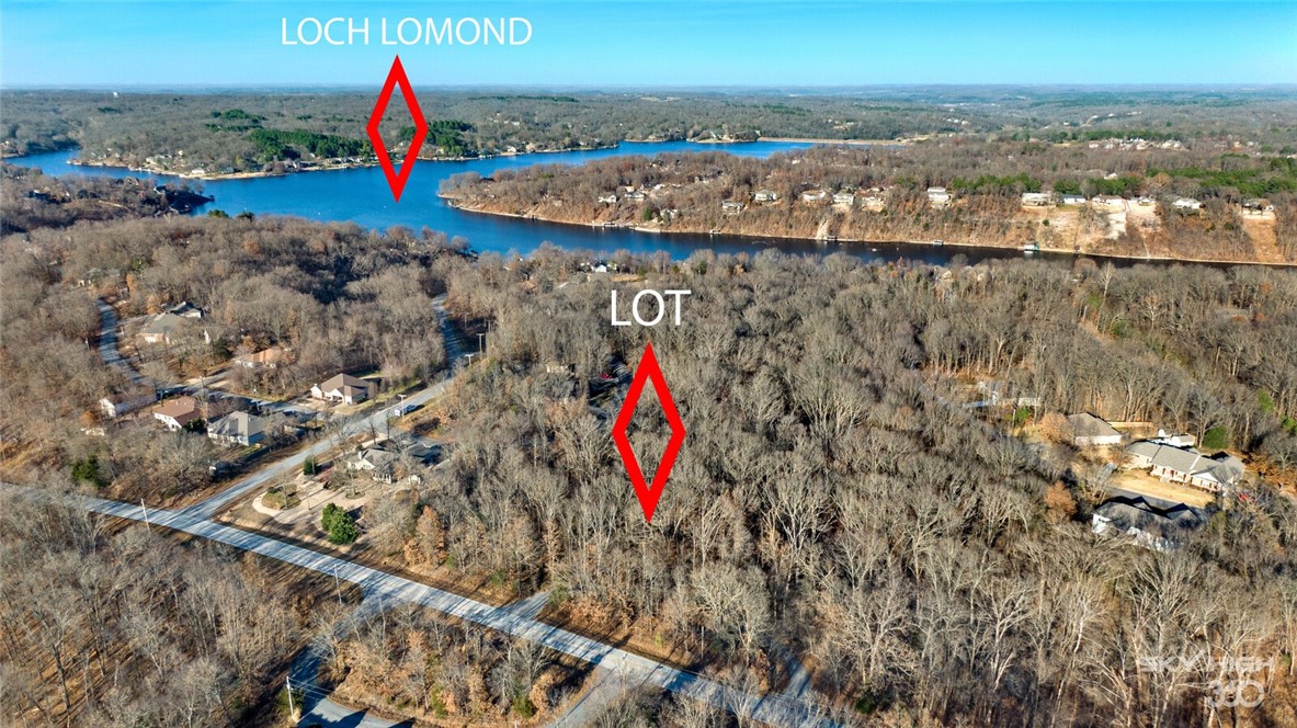 Minutes from Loch Lomond's Granton Park. Just over a half acre on a private street near Loch Lomond. Perfect for any wood artisan, or water enthusiast looking to build on a great lot. Perfect lot to build your dream home with a walk out basement and beautiful surroundings.