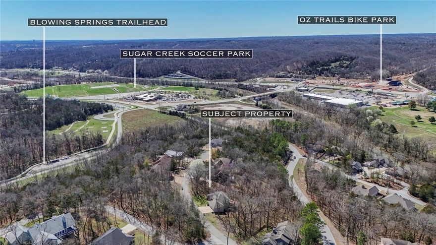 Fantastic location a block away from Blowing Springs Trailhead, 5 minutes form the Bike Lift and 15 Minutes to downtown Bentonville.  Great building lot for your new home.  Get it before it's gone!