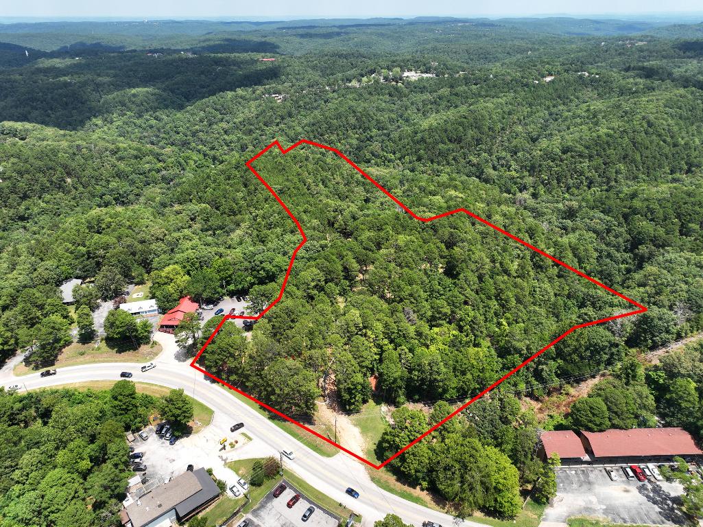 Investment Opportunity! Partially finished year-round RV Park. Currently has 13 pull throughs and 16 back ins with the potential for up to 80 sites total. Currently under construction but not complete due to passing of seller, his dream is ready to fulfill with your own touches. Nestled within the trees, secluded sites provide a certain amount of privacy. Sites include All amperage - 50/30/20 plus water and sewer. Immediate income. right in the middle of Eureka springs. within walking distance of great food and entertainment. Handy for seeing the entire tourist town or visiting local lakes or other points of interest. Newly renovated office Possible Owner Financing