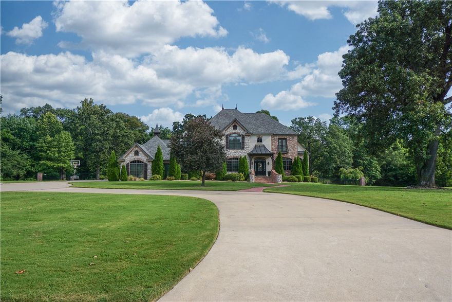 Exquisite estate home in the prestigious Talamore Subdivision.  Inside you'll find a wonderfully open floor plan perfect for family gatherings & entertaining.  Chef's kitchen is complete with double ovens, gas cooktop, 2nd sink, prep island, & Frigidaire Professional refrigerator/freezer.  Hand-scraped solid wood flooring flows beautifully throughout the main level.  Main level primary suite features his/hers vanities, oversized tub, & large walk-in shower.  Upstairs, you'll find a media room complete with a wet bar with seating; 3 spacious bedrooms, each with en suite access. Step outside to the outdoor living space of your dreams! Gunite pool, separately fenced for safety, is surrounded by a spacious cool deck lounging area.  Along with the pergola covered grilling station is a cabana for outdoor dining as well as several additional areas for conversation seating or dining.  New backyard fencing for your furry friends!