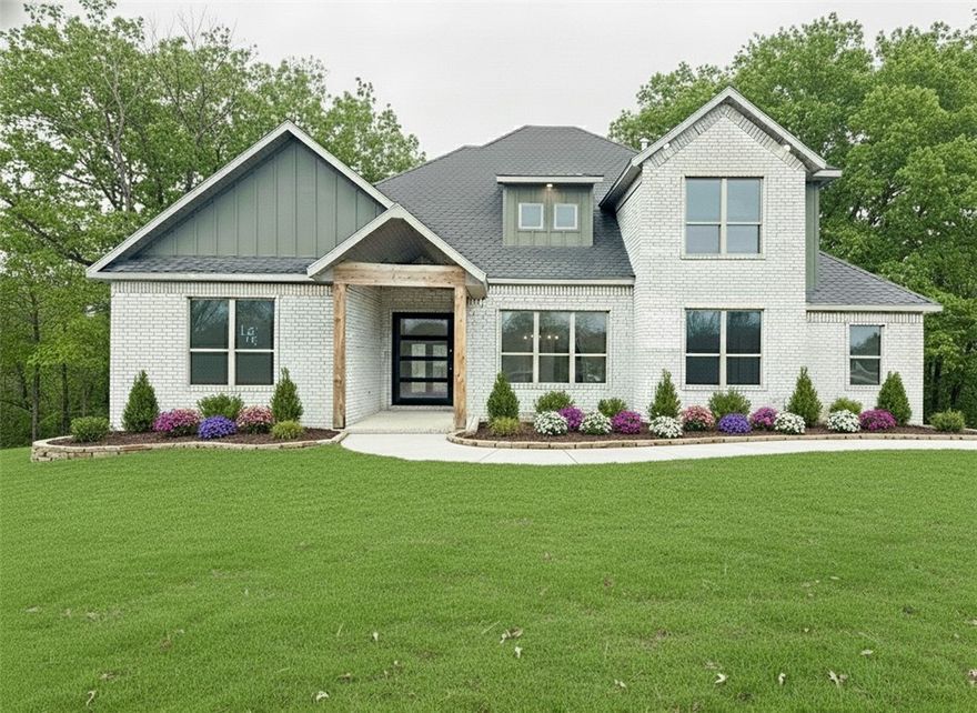 Located in the gated community of The Reserve at Serenity Ridge, this stunning 2-story Dreamwood plan offers luxury living on a spacious 1-acre lot. This home features 5 bedrooms, 4.5 bathrooms, and an inviting open layout designed for everyday comfort and high-end living. The large gourmet kitchen includes built-in banquette seating, custom soft-close cabinetry, double ovens, and sleek quartz countertops—perfect for hosting and gathering. The primary suite is a true retreat with a cozy sitting area, a spa-inspired bathroom featuring a free-standing tub, an oversized tiled shower, and a generous walk-in closet.  Enjoy year-round outdoor living on the expansive deck with a fireplace, creating the perfect backdrop for morning coffee or evening relaxation. A rare opportunity to own a beautifully crafted home on a full acre in one of NWA's most gated communities. Seller is offering $15,000 in concessions. Taxes are based on land only. Some photos are AI staged.