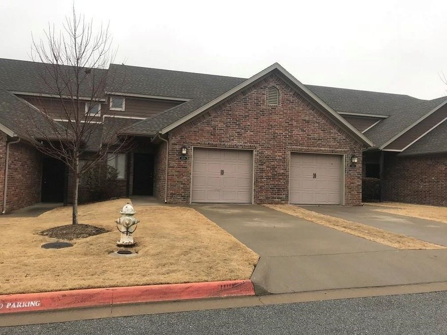 Convenient location near the University of Arkansas, I-49, Centennial Park, shopping, and all that NWA has to offer. This 2 bed 2.5 bath townhome with 1 car garage will not last long! Granite counters in kitchen with island and all appliances including the refrigerator. Full size washer & dryer included. Built in wet-bar. Patio out back for entertaining. Photos are of a similar unit. Living room may have LVP rather than carpet. Ready for move in early June.