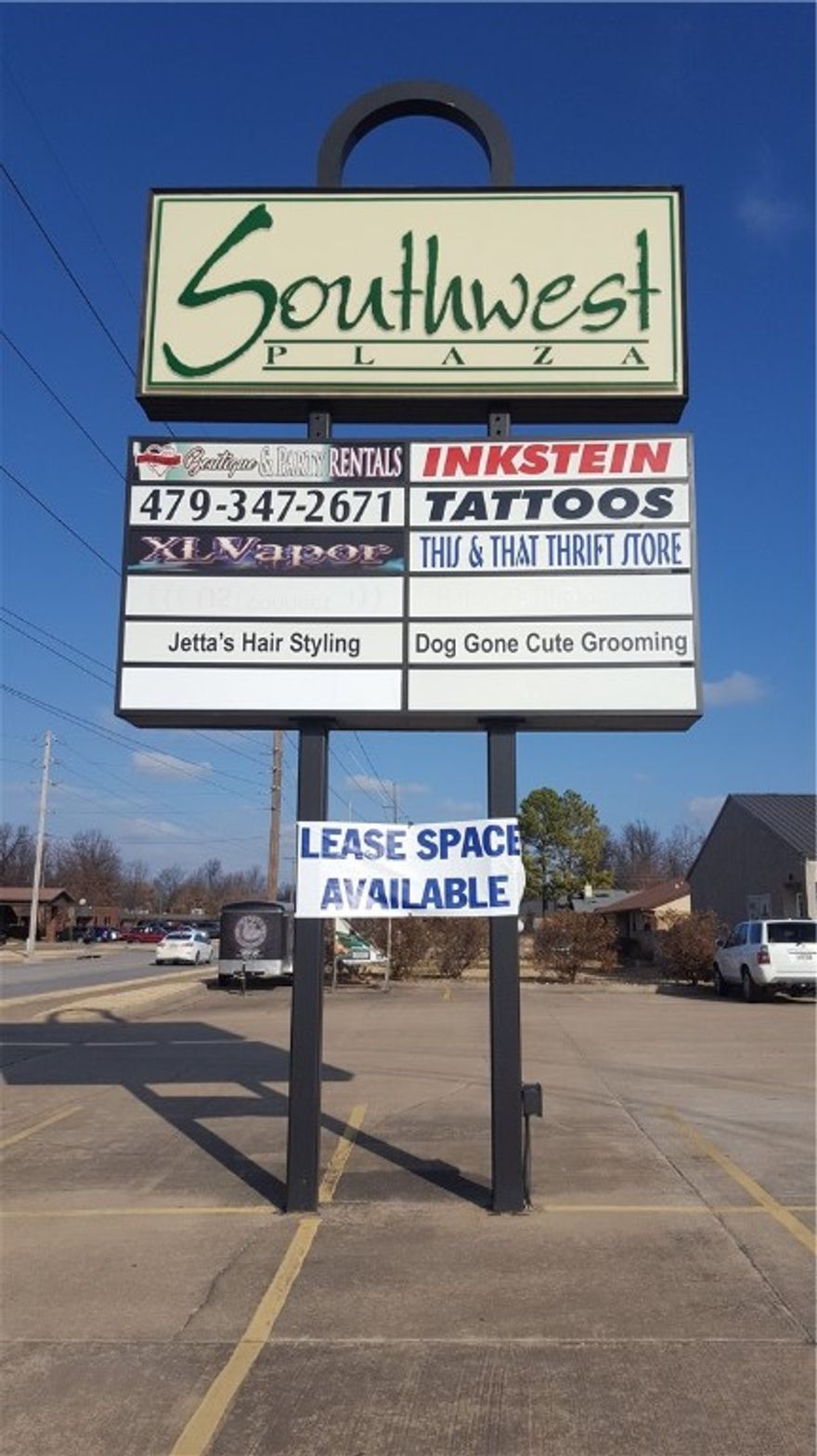 Centrally located Strip Mall with a diverse selection of businesses. Well established in a high traffic area directly across from Harps Grocery store. This unit is open and ready for a tenant. Tenant is responsible for interior build out and Exterior signage. Owner pays water, sewer and trash. Trash is a central dumpster.