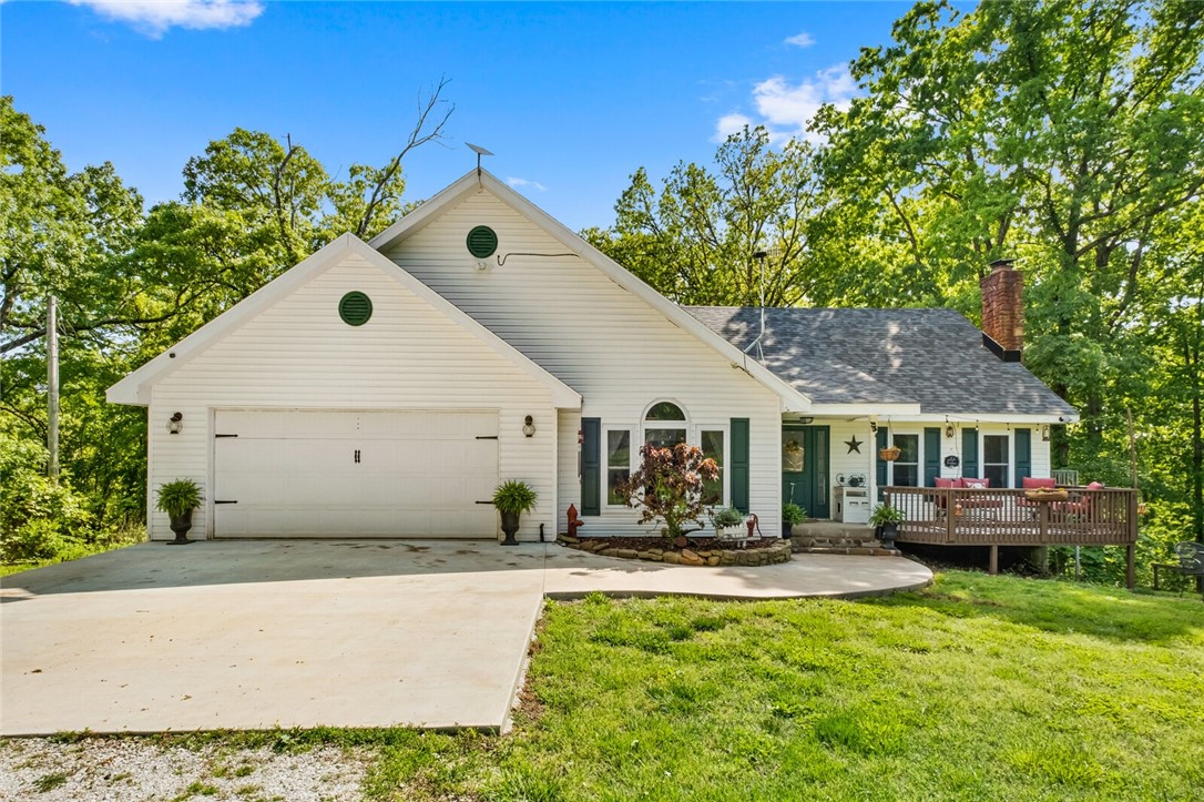 Welcome to 22601 Highway 62, Garfield, AR 72732! This 19.15-acre property features a cozy 3-bedroom, 2-bathroom home, perfect for nature lovers. Located just 20 minutes from Rogers and 25 minutes from Eureka Springs, this peaceful retreat offers abundant wildlife and the opportunity to hunt right from your back porch. Recent updates include a new roof, windows, HVAC, and renovated bathrooms. The seller is offering $10,000 in closing costs! Don't miss out on this serene lifestyleāschedule your showing today!