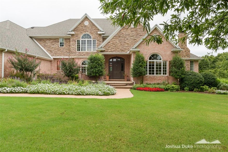 Amazing designer style home in East Fayetteville’s gated Vineyard S/D. 5,100 sq ft of livable space includes 4 bedrooms w/private bathrooms & walk in closets, gourmet eat-in-kitchen w/hearth room, formal dining, office, media room, playroom, oversized family room that opens to outdoor living. 3 w/d connections, real hardwood floors throughout the home, tons of storage, central vac, SS, security. In-ground pool, outdoor dry kitchen, separate pool bathroom. Situated on 2.0 acres of landscaped property. Vandergriff Elementary.