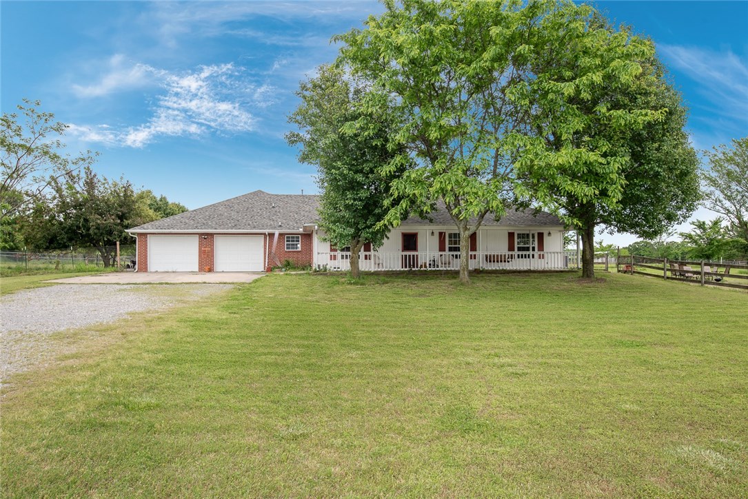 Country home located on 50 acres just right outside of town on natural gas & city water. Home has many additional features to take the full advantage of private country living. Kitchen is open with an abundance of cabinets, with newer dishwasher, counters, sink and faucet, and vent hood. Open floor plan into living area with gas fireplace. Utility room with sink and cabinets for storage. New hot water heater, heat & air conditioner and central vacuum. Master bedroom with own master bath that includes a walk-in shower and whirlpool tub. Large workshop with electric and barn with loft provides ample workspace. Beautifully secluded home, you won’t want to miss.