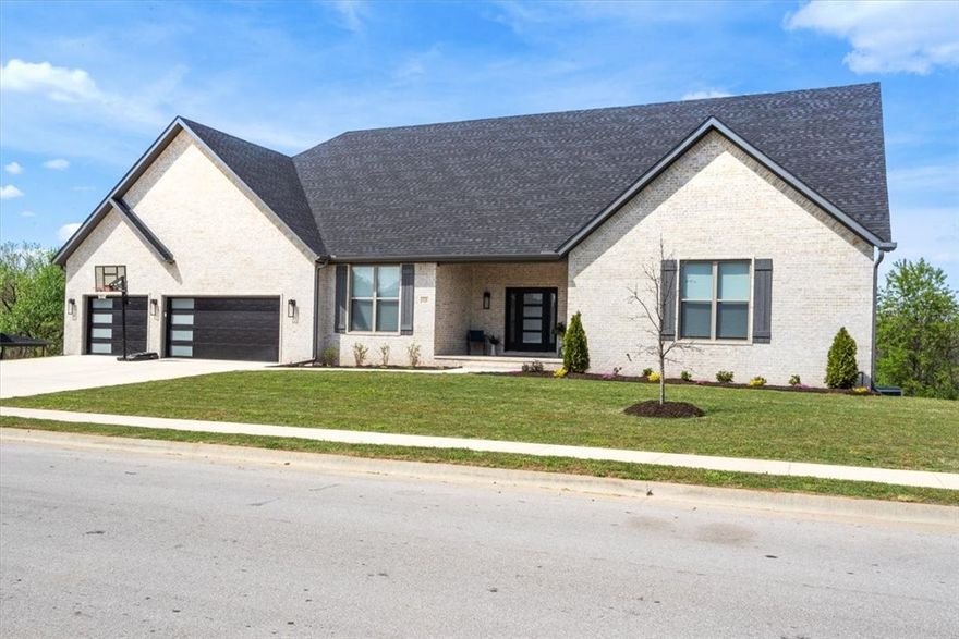 Truly a one of kind custom built home! Two complete and separate living areas! This beautiful home has a spacious floor plan and big windows to let in the natural light. The large windows overlook the rolling fields behind the home. Rich wood floors and elegant trim bring the feeling of first class! The kitchen area is highlighted by custom cabinetry, gas cooktop, double ovens, under cabinet lighting, a Fisher & Paykel refrigerator, pot filler all with gorgeous Cambria Quartz. A large primary suite with oversized windows is luxury defined. A spa like bathroom with floating vanities & under cabinet lighting connects to the massive primary closet. You have to see it to believe it! The downstairs living space is separated by solid core doors has a separate exterior entry for convenience. This impressive space offers a beautiful kitchen, 2 bedrooms, large living room, a spa bathroom, storage for days and a storm shelter as well! You have to see this home to appreciate the attention to detail and focus on quality!