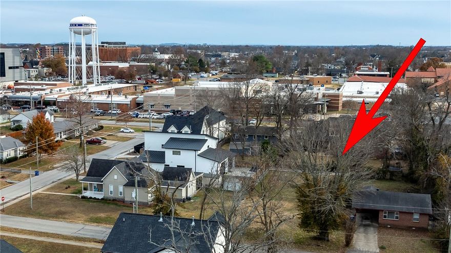 Discover Your Dream Downtown Lot in Bentonville!

This prime 60' x 150' lot, complete with convenient alley access, offers the perfect opportunity to design and build your dream home in one of Bentonville's most desirable areas. Situated in the sought-after Northwest inner quadrant, surrounded by beautiful multi-million dollar homes, this property is a rare gem that combines location, space, and lifestyle.

Downtown Bentonville is the heart of a vibrant community, known for its world-class restaurants, charming boutique shops, and the convenience of a local grocery store just a stroll away. Enjoy the city's unique blend of small-town charm and modern amenities, all within walking distance. From cultural events and bike trails to farmer’s markets and the renowned Crystal Bridges Museum, Bentonville offers an unmatched lifestyle you’ll love to call home.

Don’t miss this chance to be part of the thriving and welcoming Bentonville downtown scene.