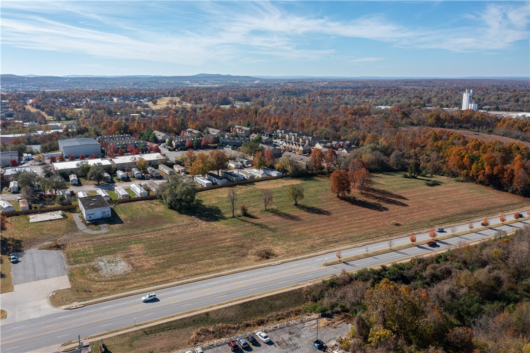 Unlimited Development potential - can divide into requested acreage sizes. Land wraps around the construction of the new McDonalds. Currently zoned C-5. Less than a half mile from Tyson world headquarters.