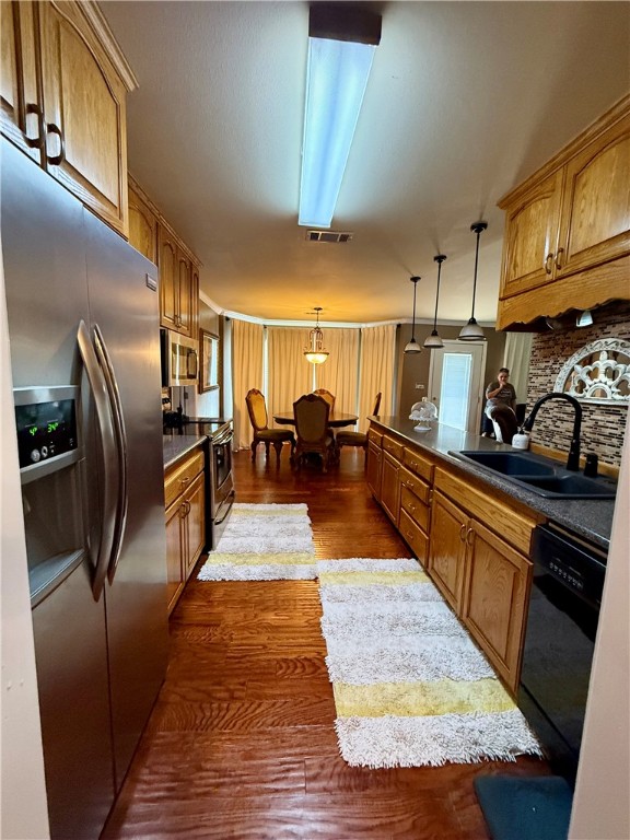 Nestled in a welcoming Dardanelle neighborhood just minutes from shopping, schools, and the scenic Mount Nebo State Park, this beautifully cared-for 3-bedroom, 2-bath home spans 1,661 sq ft and sits amid a lush, manicured yard framed by mature trees. The inviting exterior boasts an RV carport and a generous deck with an above-ground pool—ideal for summer entertaining—while the interior delights with warm wood floors, a walk-in pantry, spacious walk-in closets, and a standout custom cherry-wood mantel that adds elegant character. The garage, featuring tin and barn-wood accents, offers versatile bonus-room potential—perfect for a mancave or workshop. Combining thoughtful functional design with rustic charm and natural beauty, this home offers a rare blend of comfort, charm, and convenience.