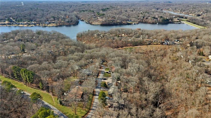 Spacious Bella Vista home with 5 bedrooms, 3 bathrooms, and 2,416 sq ft of all-tile flooring. Features a chain-link fenced backyard, wooded privacy, and a comfortable layout with plenty of space. Incredible location just minutes from Tanyard Creek Nature Trail, the Bella Vista Waterfall, and access to the lake and outdoor activities.