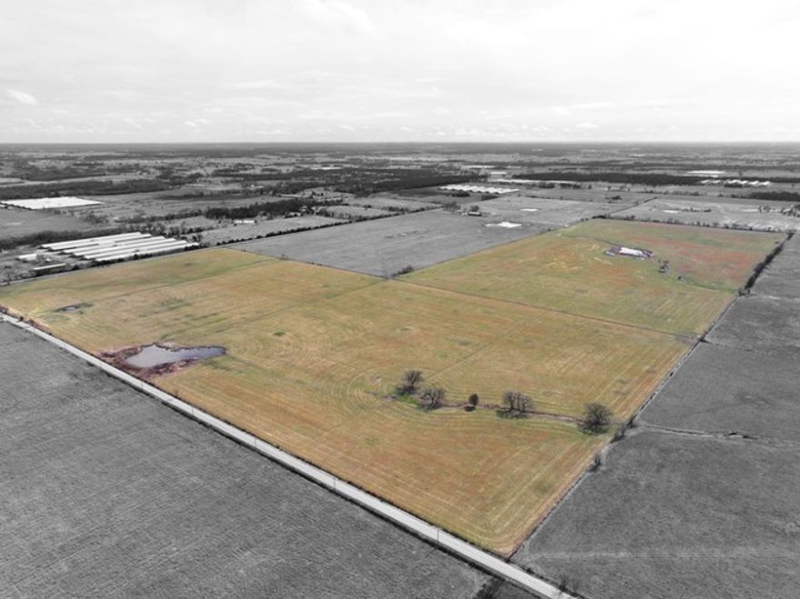 Perfect spot to start your ranch on these 162 acres of flat open, tillable, smooth, lush grazing land. Fenced and cross fenced with multiple ponds. Well-kept and groomed land is high production hay ground. Country life but not far from it all.