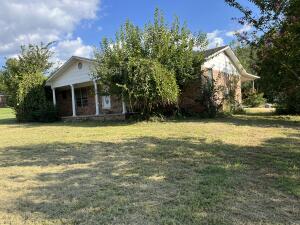 Location is prime for this 4 bedroom 2 bath home located on the outskirts of Russellville. It is on 1.29 acres, has a fenced backyard, a fenced area for a garden, and a 1200 sq/ft outbuilding. Home will be sold as is.All offers must be submitted by the Buyer's agent via ResNet Agent Portal. To submit your buyer's offer use this link: https://agent.res.net/Offers.aspx?-1770145