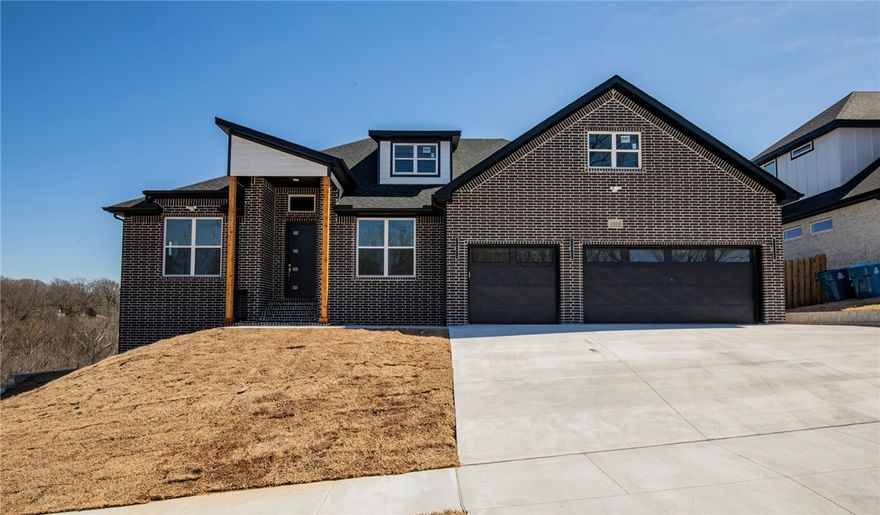 Contemporary stunner in Grammercy Park minutes from Walmart ISD, Memorial Park, & downtown. With 4 bedrooms, 4 full baths, 2 living rooms, office, media room, & game room this home has it all! The open kitchen has a huge island, quartz countertops, & Frigidaire Gallery appliances. The main floor living is centered around a fireplace w/ built-ins & showcases a fantastic wooded view out of the picture frame windows. The primary suite is designed for relaxation w/ built-in bedside reading lights, soaking tub, & sun-lit walk-in shower w/ massage bar. The lower level is designed for fun, beauty, & function w/ a full second living room, theater room with surround sound wiring & 4K painted screen with frame, & separate huge game room, more picture windows, wood floors, & 8in baseboards! The living is easy throughout this beautiful home with smart thermostats, the latest USB Type-C outlets in the living & primary suite, & smart Wi-Fi switches in all rooms! SELLER WILL PAY $10,000 TOWARDS BUYER'S CLOSING COSTS & PRE-PAIDS!