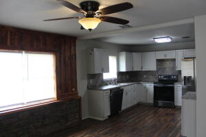 BACK ON THE MARKET. The buyer completed the inspection and VA appraisal but changed his mind just days before closing. --Unsuspecting cuteness when you walk into this home! The sellers have made a huge renovation to open up this floor plan. The sellers state they have all new electric and plumbing. New appliances, paint, flooring, bathroom updates, countertops, and more! The HVAC was completely serviced and the r(shown as tract 4 on the survey). There is also a pond. This home is easy to show. Roof is approx 9 yrs old. The master bedroom has a nice walk-out patio. Beautiful new decks show the mostly wooded 10.69 ac surrounding this home