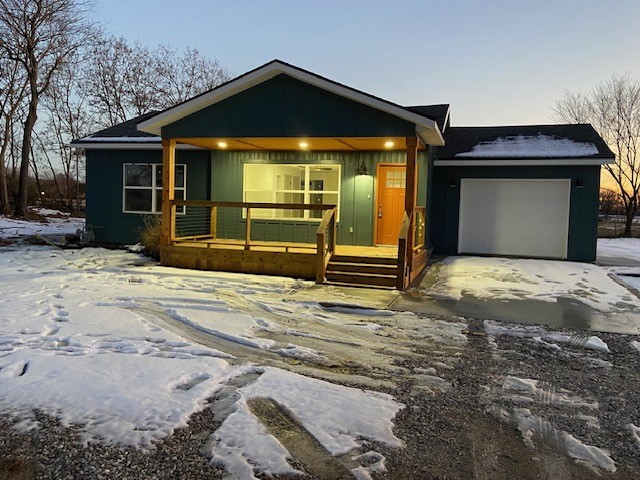 Freshly remodeled 3BR/2BA home central to all of NWA. Flat 0.5 acre mol lot. Home was taken down to the studs and everything is new - HVAC, plumbing, electrical, windows, everything! Modern kitchen boasts full appliance set up including side by side refrigerator, quartz countertops, mosaic tile backsplash, custom painted cabinets, island with bar seating! Kitchen is open to the living room. Laminate flooring throughout! Main bath features double sinks & tile walk in shower. Second bath has tub shower combo. Stacked washer & dryer in hallway. Spacious back and front decks with cable railing. Double car tandem attached garage!