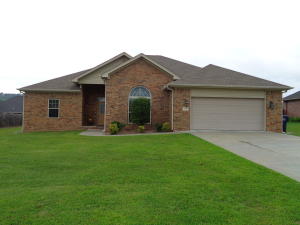 THIS IS A 'LIKE NEW' HOME! LOCATED IN COVE LANDING, IT FEATURES STAINLESS APPLIANCES, GRANITE COUNTERS, FIREPLACE, SURROUND SOUND, A FLATSCREEN TV IN THE MASTER BEDROOM, COVERED PATIO, A HUGE YARD, AND MANY MORE FEATURES, INCLUDING A ONE YEAR HOME WARRANTY PAID FOR BY THE SELLERS. PRICED AT ONLY $209,900. MLS#17-1489.