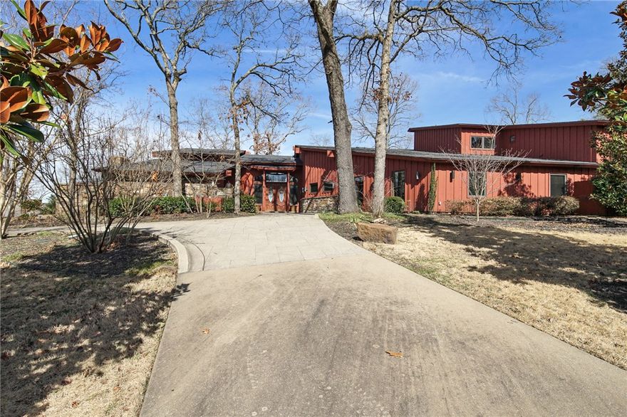 Exquisite home overlooking Beaver Lake with lake views from all rooms! This home was made for entertaining! With multiple decks, hot tub with pergola, and a screened-in porch, this outdoor living area is sure to impress! Spacious living room with soaring vaulted ceiling and wood beams, stone wall fireplace, a gorgeous stone bar, wood accent wall, and plenty of windows with that great lake view! A delightful kitchen that features granite counters, new sub-zero fridge and a pantry & food prep room separate from the rest of the kitchen, so that entertaining guests is done just right. Wake up with lake views in the master with stone wall fireplace, wood beams and leads into an oversized bathroom with walk-in shower with rainfall showerhead & separate jetted tub with a fireplace. Huge utility room with tons of cabinet space. The master closet suite is sure to impress with it's plethora of cabinets, it's dressing table, and built-in sitting area. Attached inlaw apartment with separate entry. Come see!