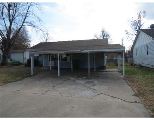 UNIQUE FOUR BEDROOMS, TWO BATHS, TWO KITCHENS, LARGE LAUNDRY ROOM, CENTRAL HEAT AND AIR, FENCED YARD, CLOSE TO SCHOOLS AND SHOPPING.