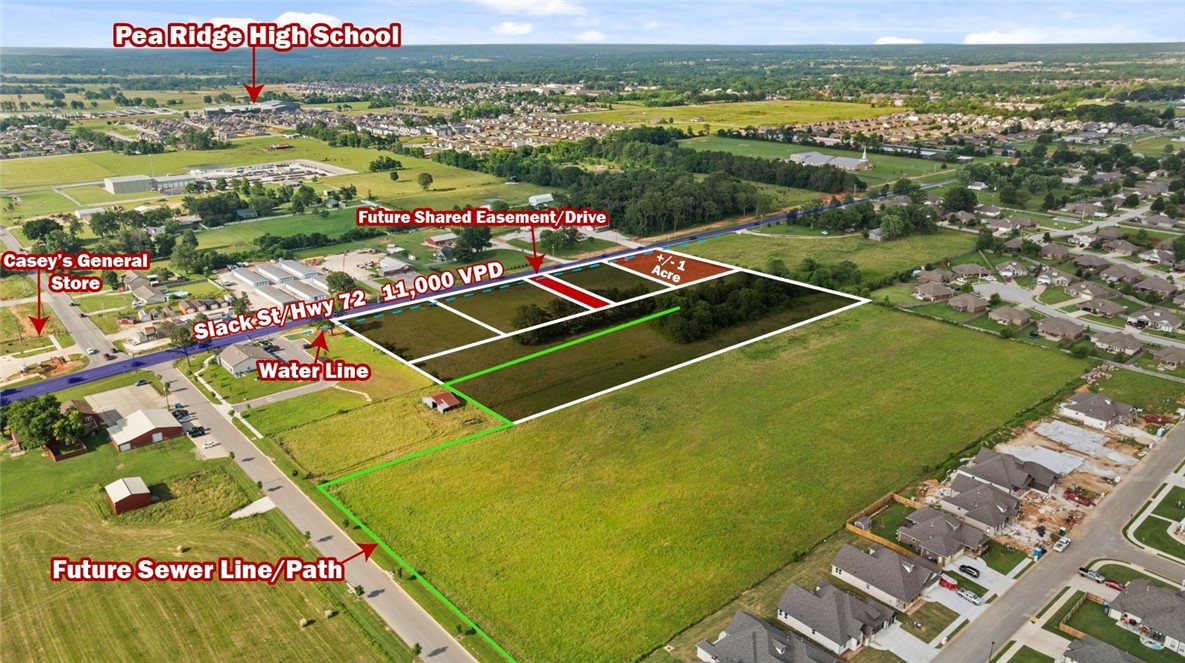 +/- 1 acre of level, cleared land right off Slack St/Hwy 72 in Pea Ridge, with approx. 180' of road frontage and around 10,000 VPD for high visibility. Zoned C-1 Neighborhood Commercial, this prime location is ideal for a bank, medical or general office building, retail space, or restaurant. Situated near the upcoming Casey's General Store, this property is in a thriving area. Pea Ridge is one of Northwest Arkansas' fastest growing cities, with over 400 building permits issued in 2023, surpassing even Springdale, AR!